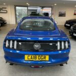 Blue Ford Mustang rear view