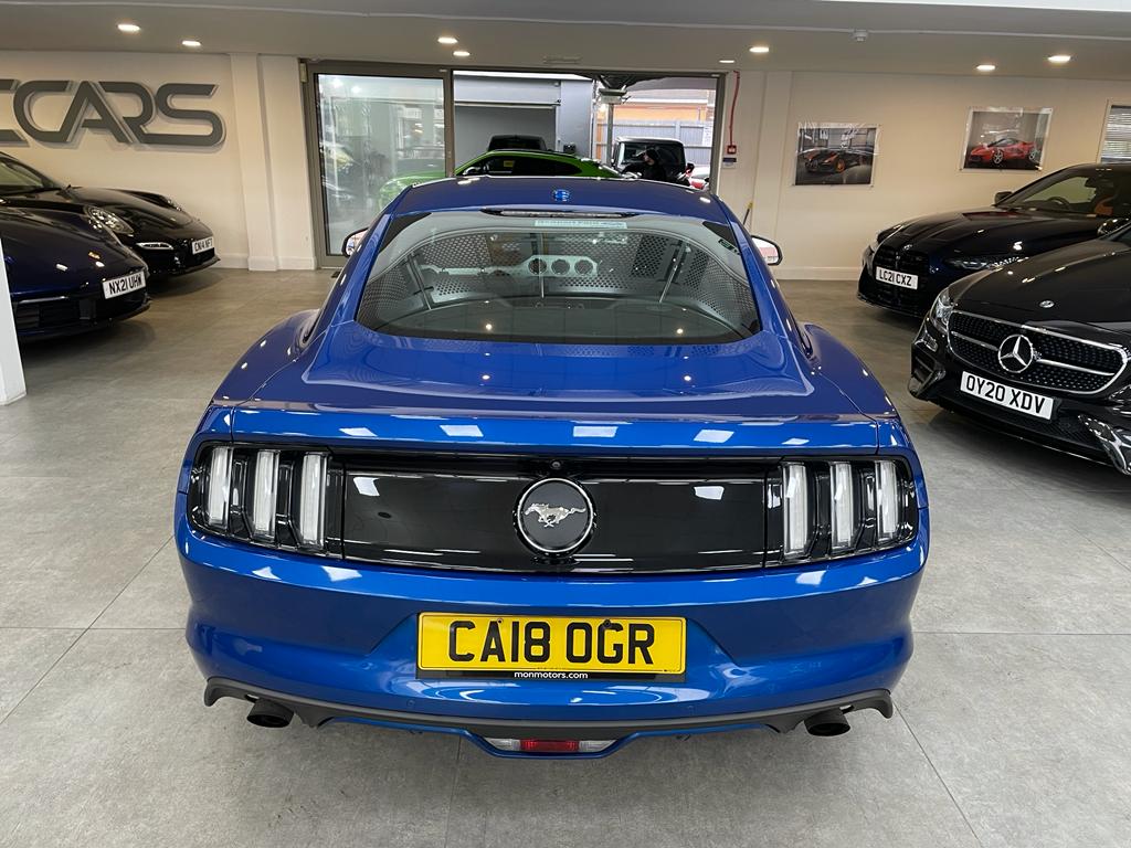 Blue Ford Mustang rear view